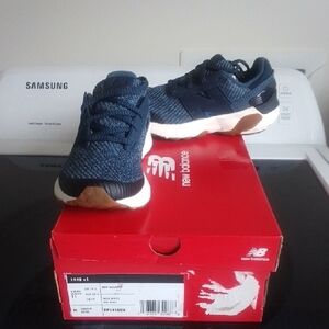 New Balance Blue Sneakers with Sleek Design and White Sole